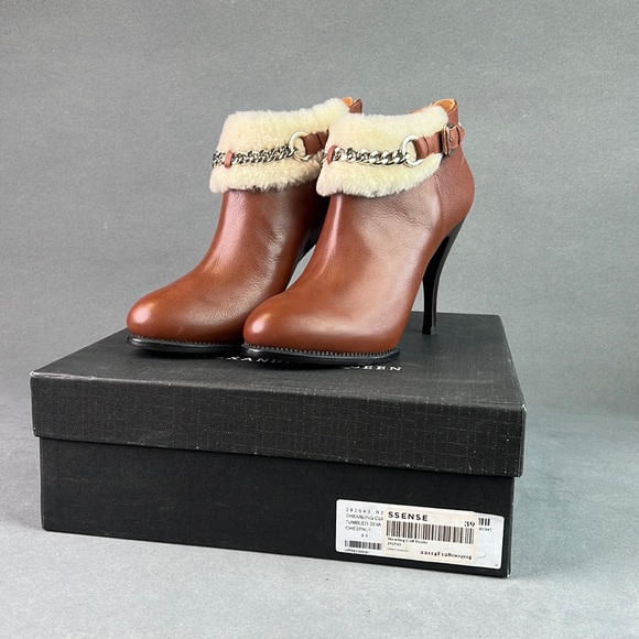 Alexander McQueen Shoes - Alexander McQueen shearling cuff leather bootie. Brand new never worn. Size 39